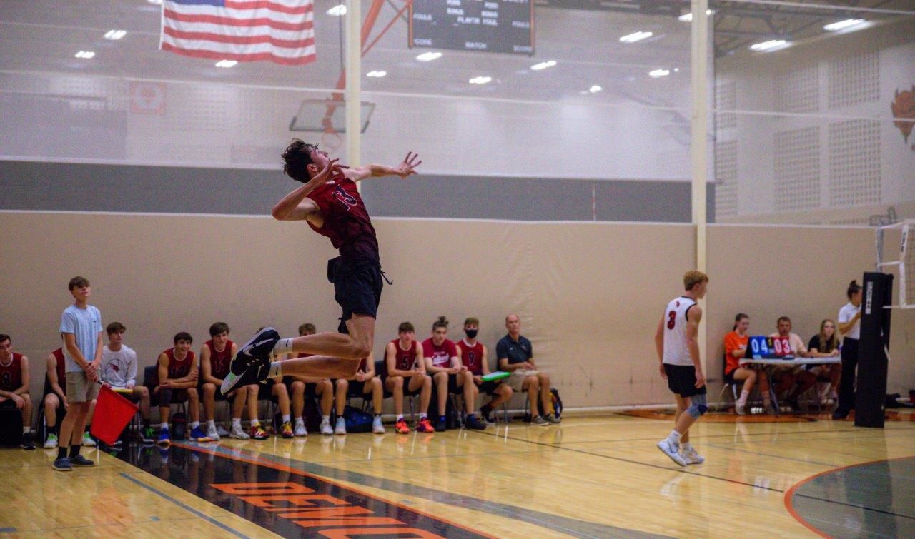 Cole jump serving.jpg